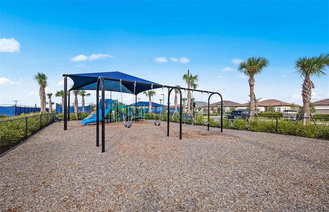 community play area featuring fence