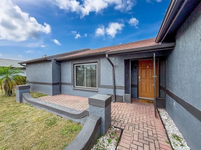 7237 Bramblewood Dr, Port Richey, FL 34668 - exterior space featuring stucco siding