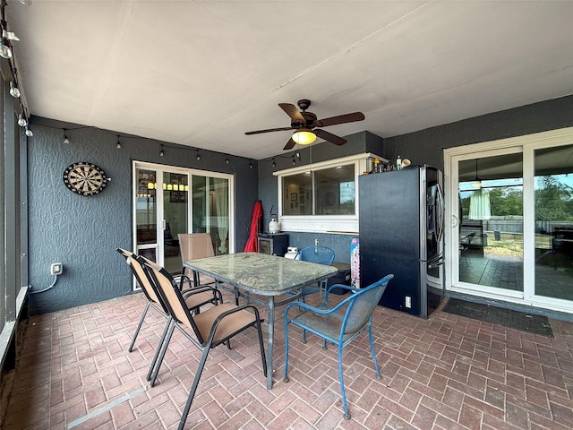7237 Bramblewood Dr, Port Richey, FL 34668 - view of patio with outdoor dining area and a ceiling fan
