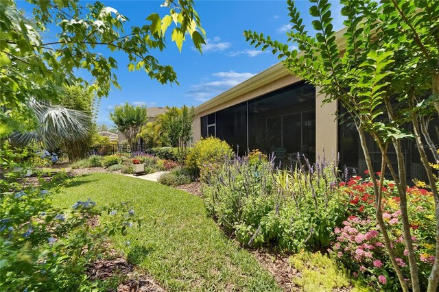 6507 Maiden Sea Dr, Apollo Beach, FL 33572 - view of yard with a sunroom