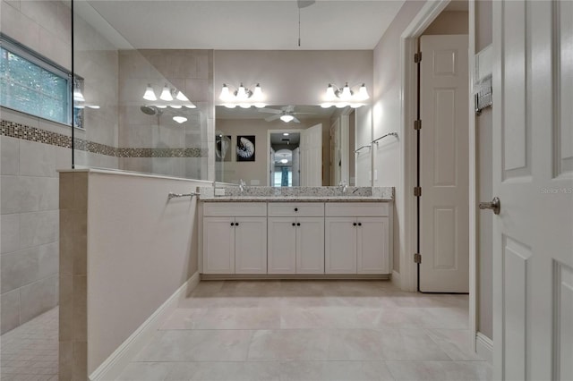 6507 Maiden Sea Dr, Apollo Beach, FL 33572 - bathroom featuring double vanity, a walk in shower, a ceiling fan, and a wealth of natural light