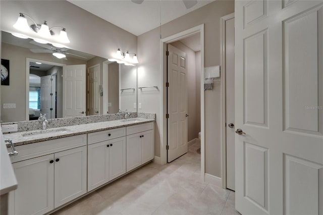 6507 Maiden Sea Dr, Apollo Beach, FL 33572 - bathroom with a sink, a ceiling fan, double vanity, and connected bathroom