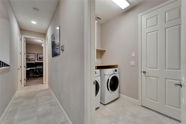 6507 Maiden Sea Dr, Apollo Beach, FL 33572 - clothes washing area with laundry area, washer and clothes dryer, baseboards, and visible vents