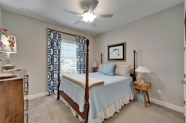 6507 Maiden Sea Dr, Apollo Beach, FL 33572 - bedroom featuring baseboards, ceiling fan, and light colored carpet
