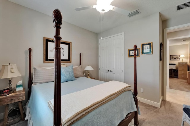 6507 Maiden Sea Dr, Apollo Beach, FL 33572 - carpeted bedroom with baseboards, a ceiling fan, a closet, and visible vents