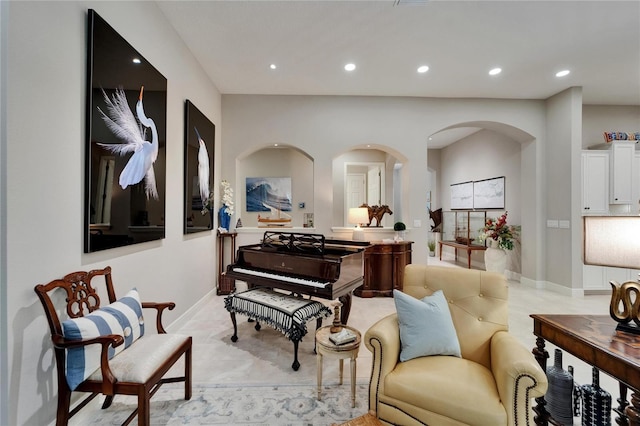 6507 Maiden Sea Dr, Apollo Beach, FL 33572 - living area featuring arched walkways, baseboards, and recessed lighting