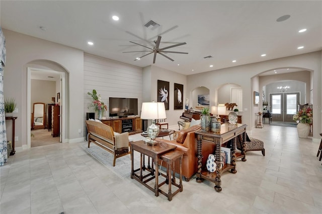 6507 Maiden Sea Dr, Apollo Beach, FL 33572 - living room with a ceiling fan, arched walkways, recessed lighting, and visible vents