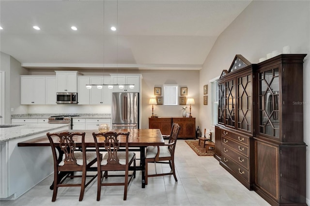 6507 Maiden Sea Dr, Apollo Beach, FL 33572 - dining space featuring recessed lighting and vaulted ceiling