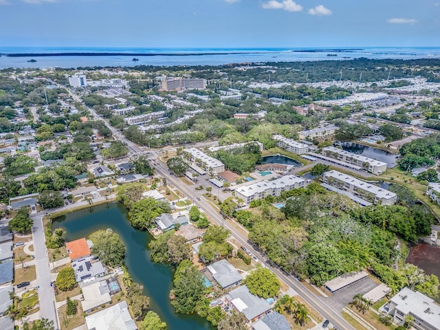 bird's eye view with a water view