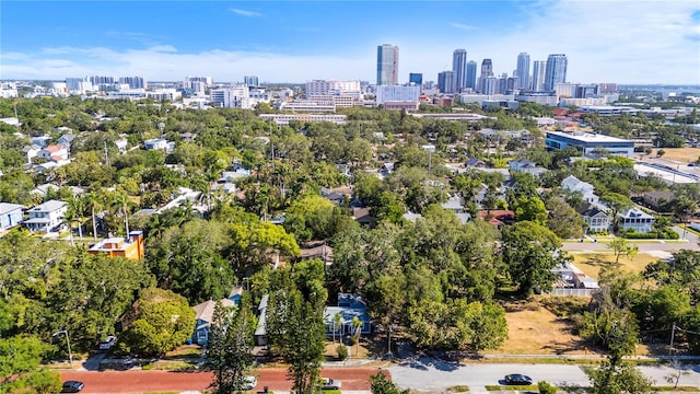 birds eye view of property with a view of city