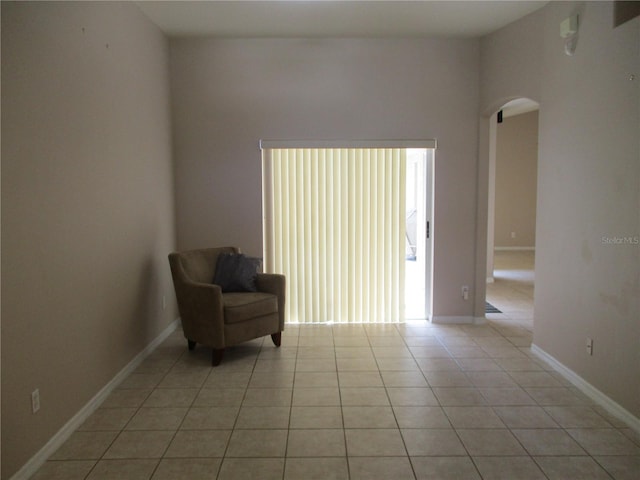 2213 Towering Oaks Cir, Seffner, FL 33584 - living area with arched walkways and light tile patterned flooring