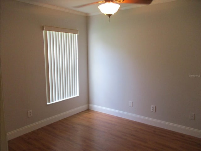 2213 Towering Oaks Cir, Seffner, FL 33584 - spare room with wood finished floors, a ceiling fan, plenty of natural light, and crown molding