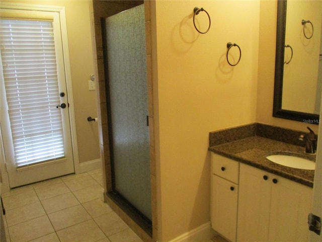 2213 Towering Oaks Cir, Seffner, FL 33584 - full bath featuring vanity, a stall shower, and tile patterned flooring