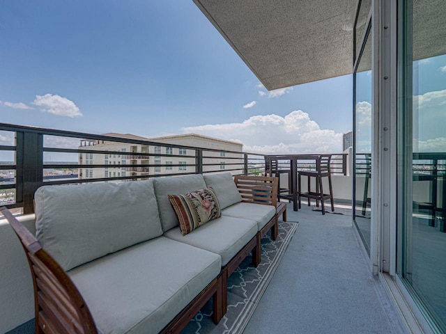 balcony featuring outdoor lounge area