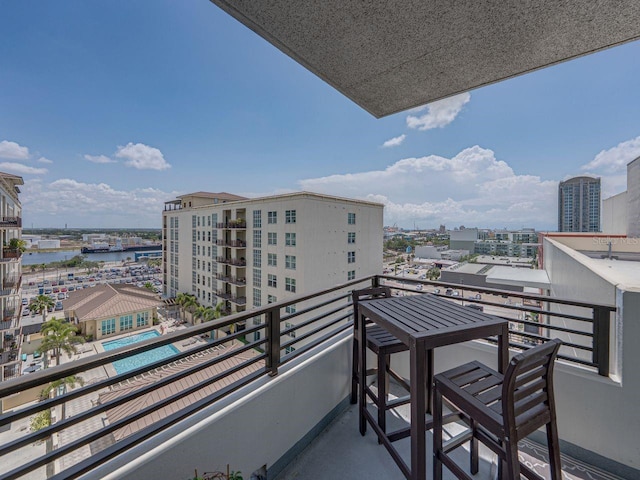 balcony with a city view and a water view