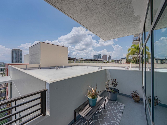 balcony featuring a view of city
