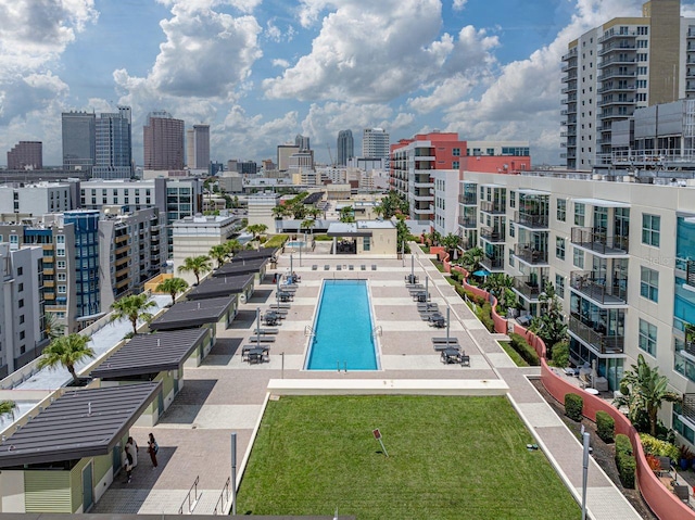 view of pool with a view of city