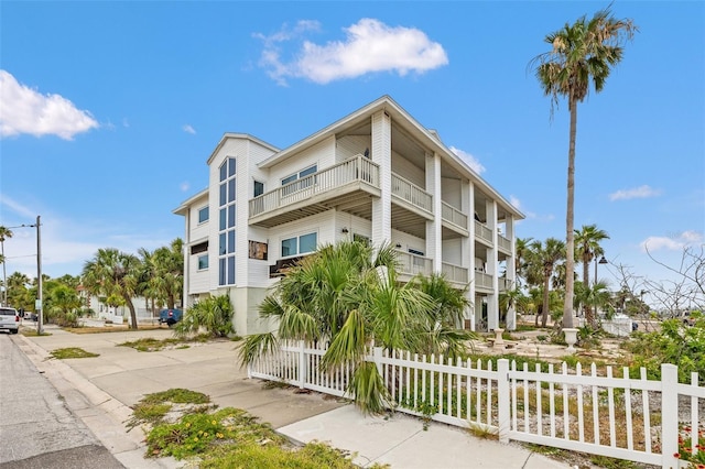 1104 Pass A Grille Way, St Pete Beach, FL 33706 - view of property featuring a fenced front yard