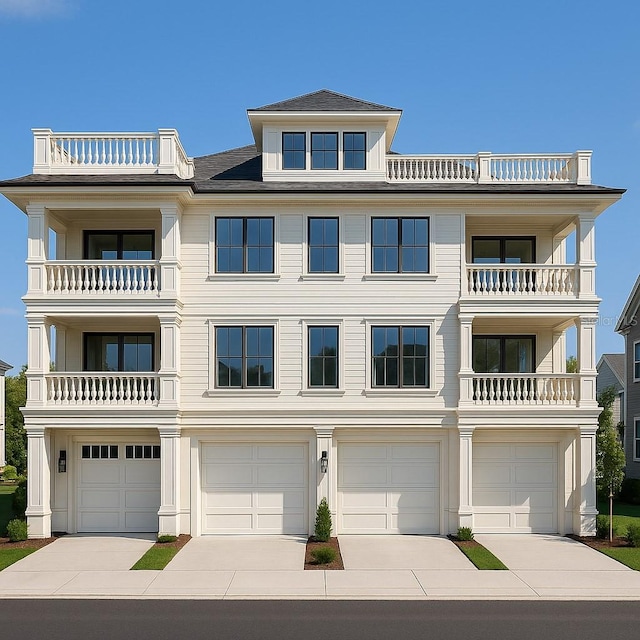 1104 Pass A Grille Way, St Pete Beach, FL 33706 - view of front of house with driveway, an attached garage, and a balcony
