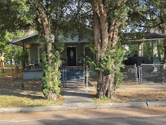 view of front of home with a gate and a fenced front yard