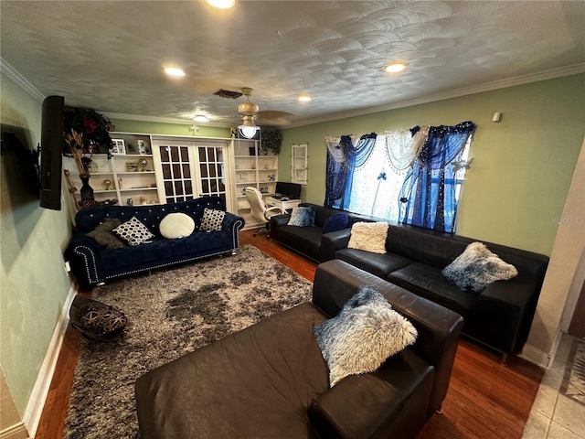 1101 Alcazar Way S, Saint Petersburg, FL 33705 - living area featuring a ceiling fan, baseboards, visible vents, and ornamental molding