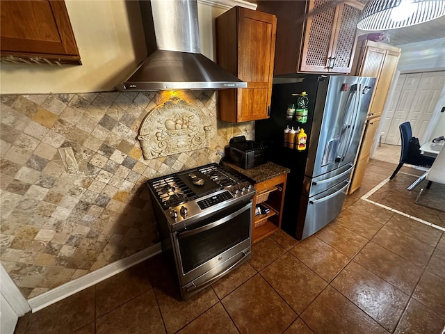 1101 Alcazar Way S, Saint Petersburg, FL 33705 - kitchen featuring decorative backsplash, dark countertops, wall chimney exhaust hood, brown cabinets, and appliances with stainless steel finishes
