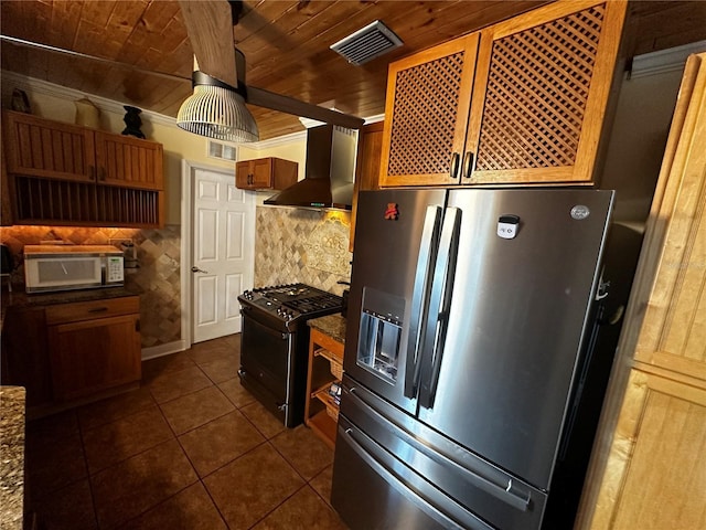 1101 Alcazar Way S, Saint Petersburg, FL 33705 - kitchen featuring stainless steel refrigerator with ice dispenser, gas stove, wooden ceiling, white microwave, and wall chimney exhaust hood