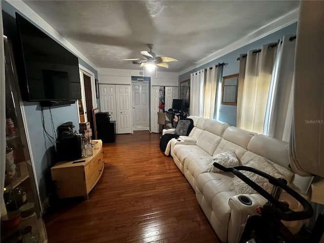 1101 Alcazar Way S, Saint Petersburg, FL 33705 - living room featuring a ceiling fan and dark wood-type flooring