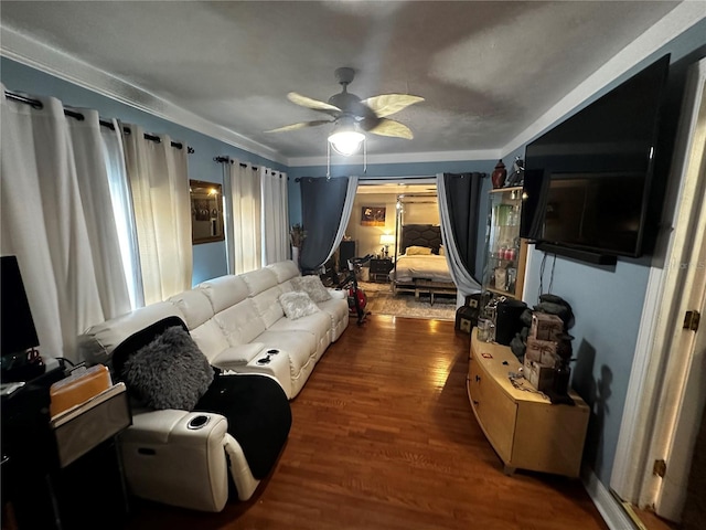 1101 Alcazar Way S, Saint Petersburg, FL 33705 - living room with ornamental molding, a ceiling fan, and wood finished floors