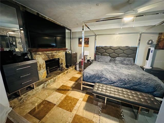1101 Alcazar Way S, Saint Petersburg, FL 33705 - bedroom featuring a stone fireplace
