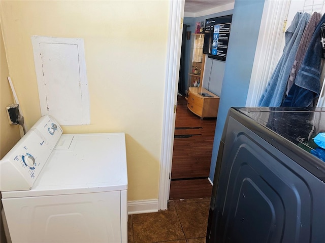 1101 Alcazar Way S, Saint Petersburg, FL 33705 - laundry room featuring laundry area, washing machine and dryer, baseboards, tile patterned floors, and electric panel