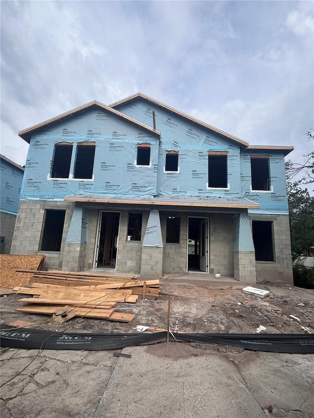 406 N Westland St Unit 1, Tampa, FL 33609 - property under construction with covered porch and concrete block siding