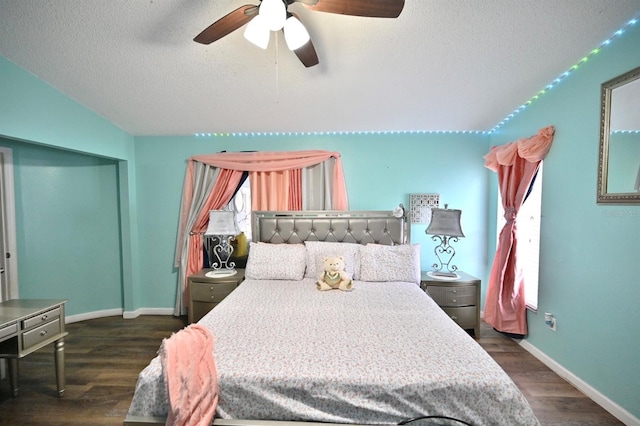 11314 Silverleaf Ct, Riverview, FL 33579 - bedroom with vaulted ceiling, a textured ceiling, dark wood finished floors, baseboards, and a ceiling fan