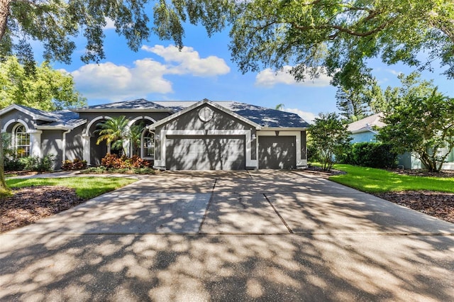 4690 Wrentham Pl, Palm Harbor, FL 34685 - single story home with an attached garage, concrete driveway, and a front yard