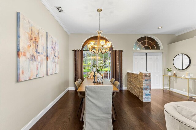 4690 Wrentham Pl, Palm Harbor, FL 34685 - dining area with a chandelier, dark wood-style flooring, ornamental molding, and recessed lighting