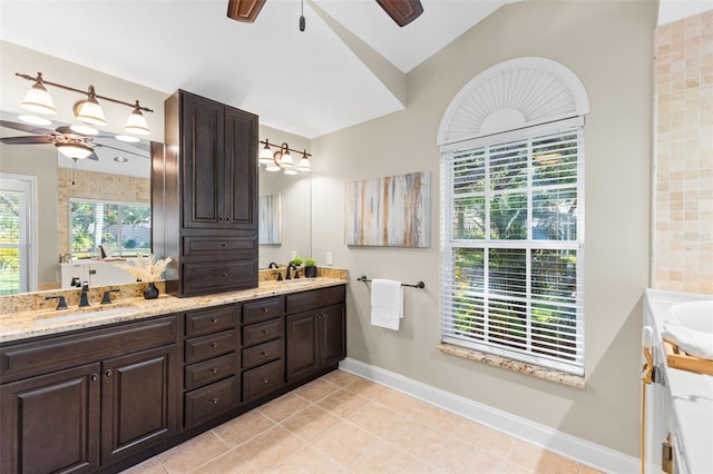 4690 Wrentham Pl, Palm Harbor, FL 34685 - bathroom featuring a ceiling fan, double vanity, and plenty of natural light