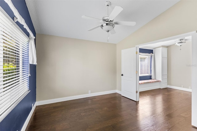 4690 Wrentham Pl, Palm Harbor, FL 34685 - unfurnished room with lofted ceiling, ceiling fan, and dark wood-type flooring