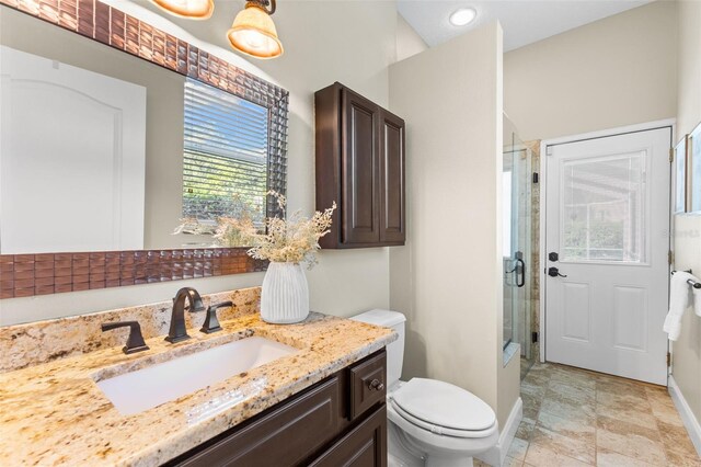 4690 Wrentham Pl, Palm Harbor, FL 34685 - bathroom featuring an enclosed shower and vanity
