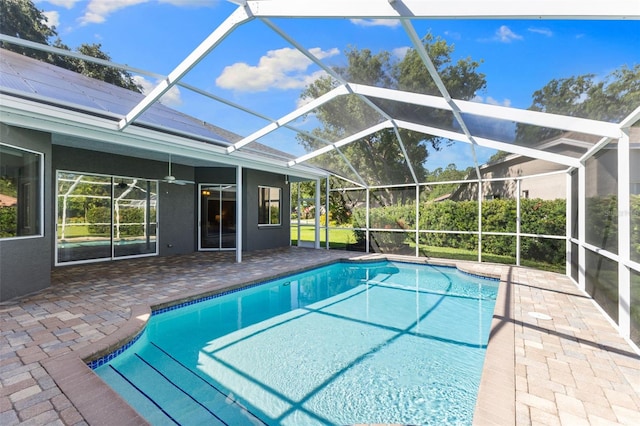 4690 Wrentham Pl, Palm Harbor, FL 34685 - view of swimming pool with a patio, ceiling fan, and glass enclosure