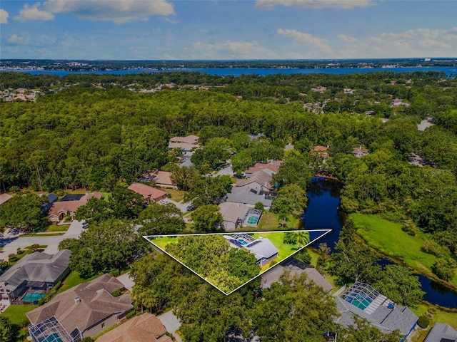 4690 Wrentham Pl, Palm Harbor, FL 34685 - aerial view of residential area featuring property parcel outlined and a nearby body of water