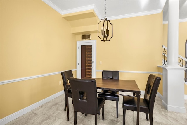 dining area featuring crown molding, baseboards, and an inviting chandelier