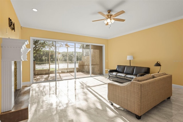 living room featuring crown molding, baseboards, ceiling fan, recessed lighting, and a water view