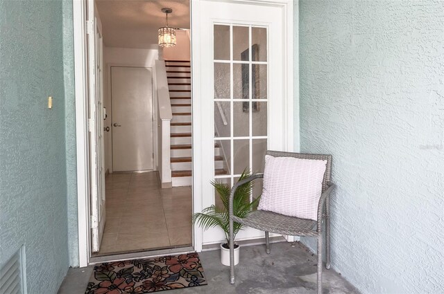 623 Garland Cir, Indian Rocks Beach, FL 33785 - entrance to property with stucco siding