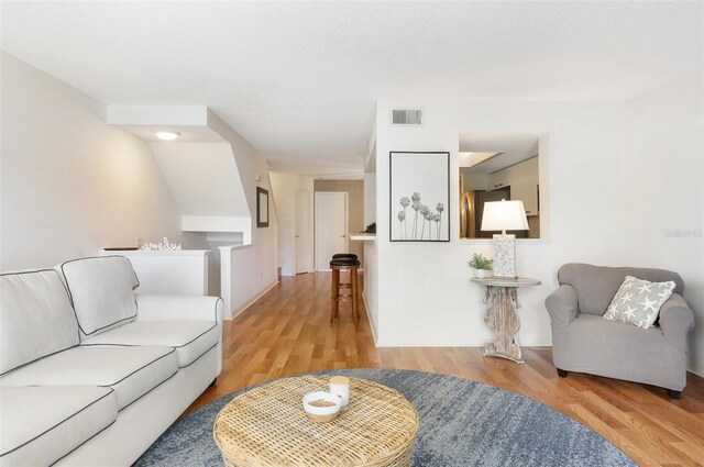 623 Garland Cir, Indian Rocks Beach, FL 33785 - living area with wood finished floors