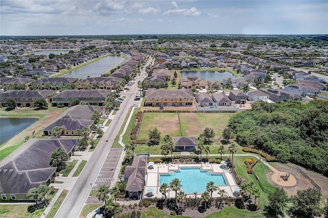 aerial view with a residential view and a water view