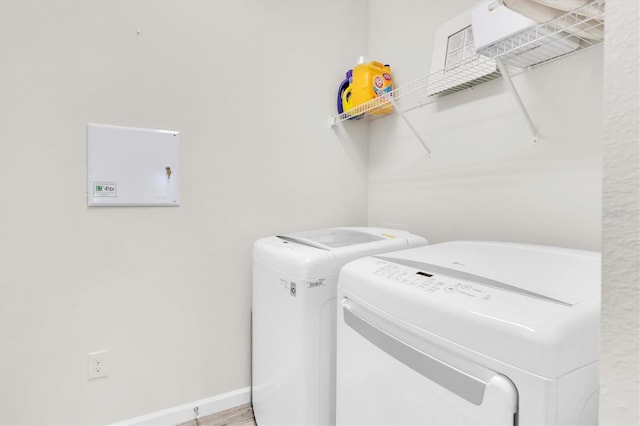 11626 Blue Woods Dr, Riverview, FL 33569 - laundry area featuring washer and dryer and baseboards
