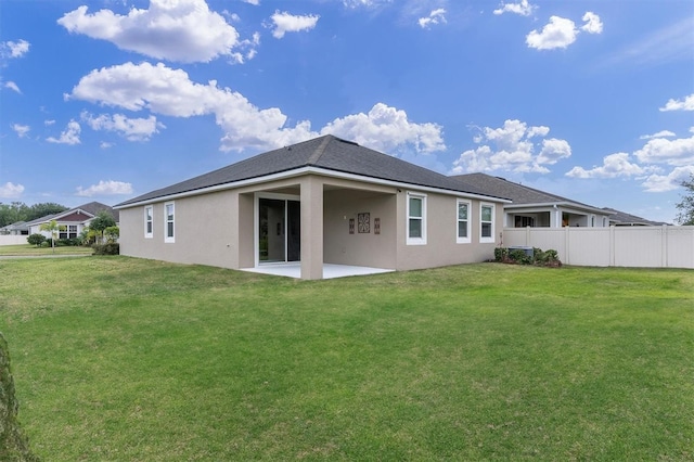 11626 Blue Woods Dr, Riverview, FL 33569 - back of house with stucco siding and a patio area