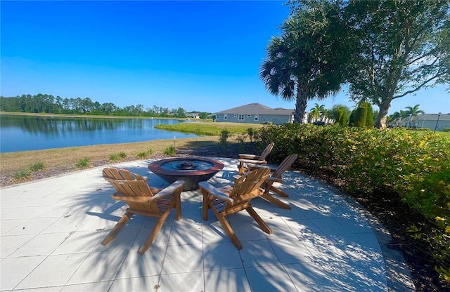 11626 Blue Woods Dr, Riverview, FL 33569 - view of patio / terrace featuring a fire pit and a water view