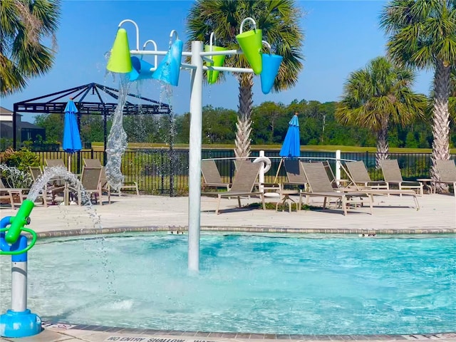 11626 Blue Woods Dr, Riverview, FL 33569 - community pool with a water play area and a deck