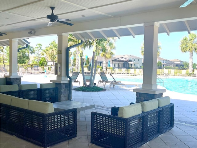 11626 Blue Woods Dr, Riverview, FL 33569 - view of patio / terrace featuring a ceiling fan, an outdoor hangout area, and a community pool